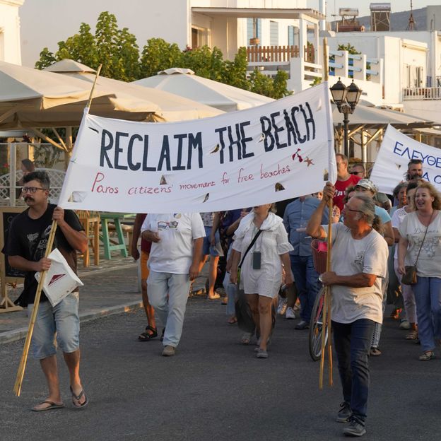 What to know about the ‘beach towel revolt’ taking back Greek beaches