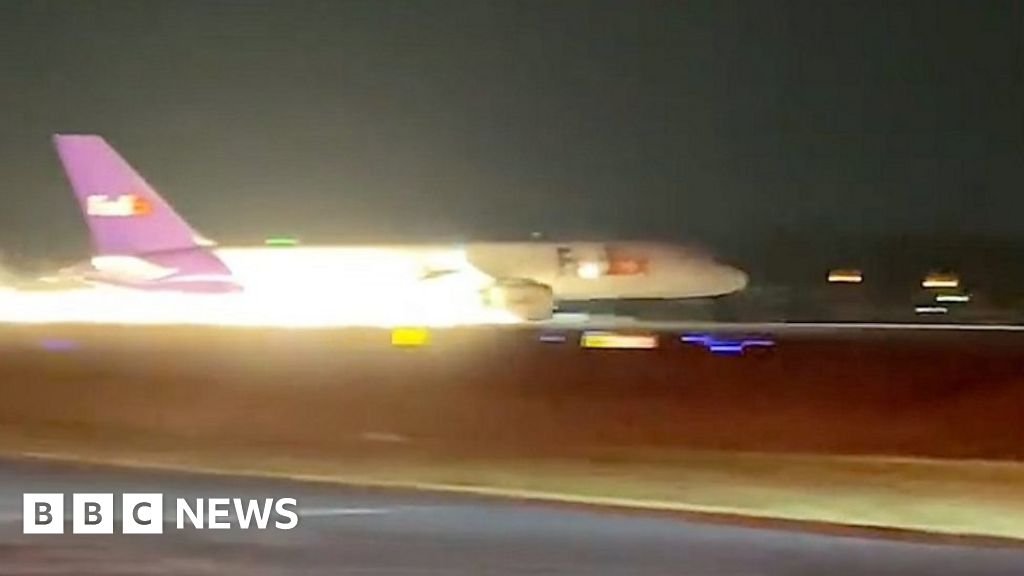 Watch: Sparks sent flying in precarious landing