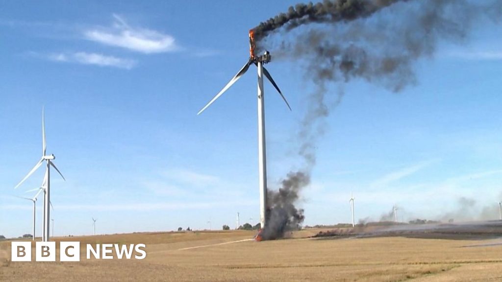 Giant blade crashes to ground as fire destroys wind turbine