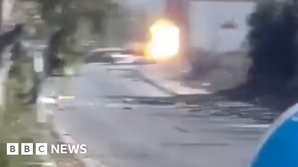 Watch: Tank fires near car on key Gaza evacuation road