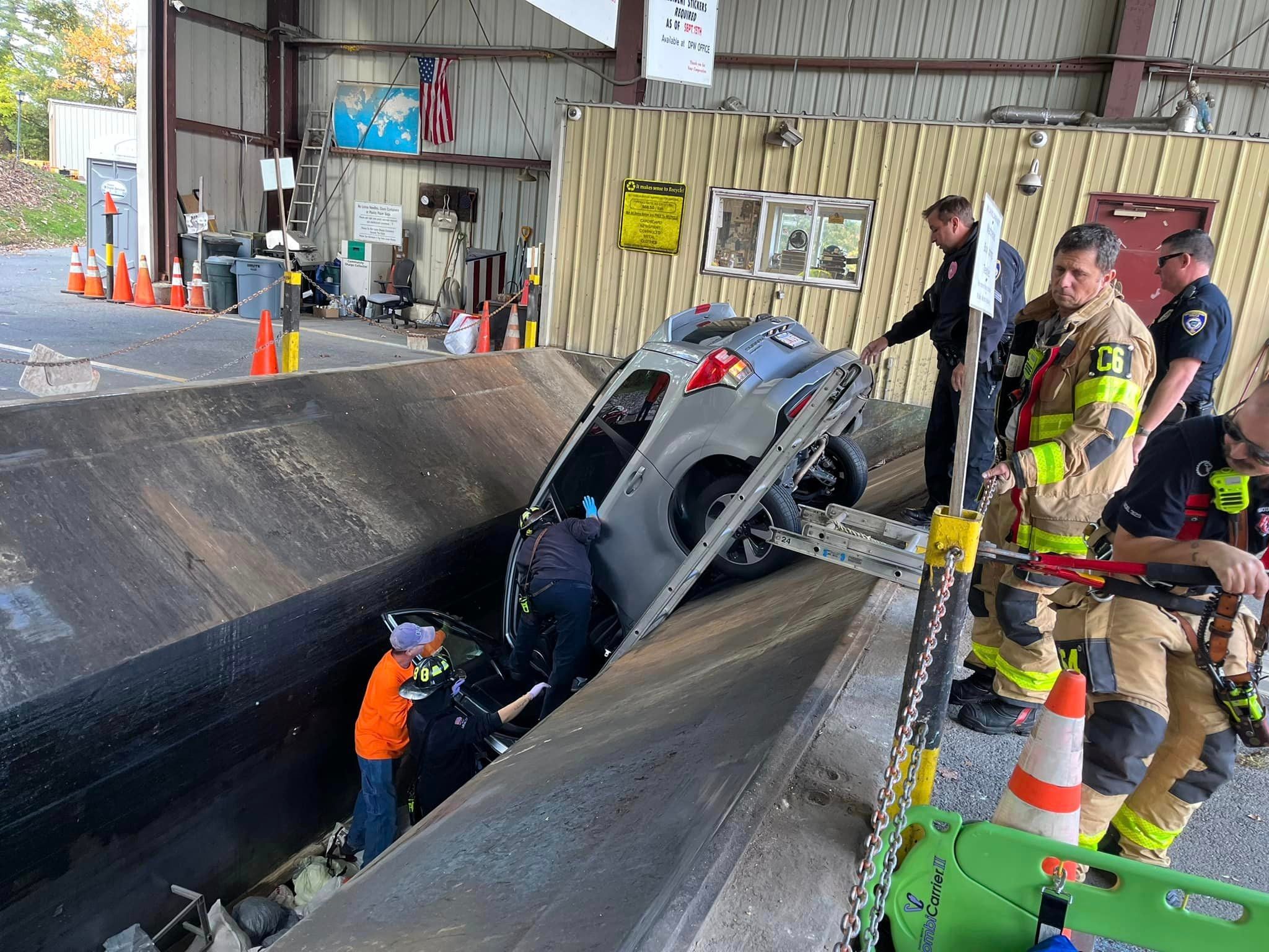 Driver in Southborough gets car stuck in trash compactor