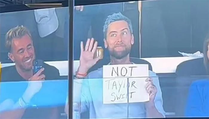 Lance Bass Pokes Fun Swifties with a Funny ‘Not Taylor Swift’ Banner During a Los Angeles Chargers Game