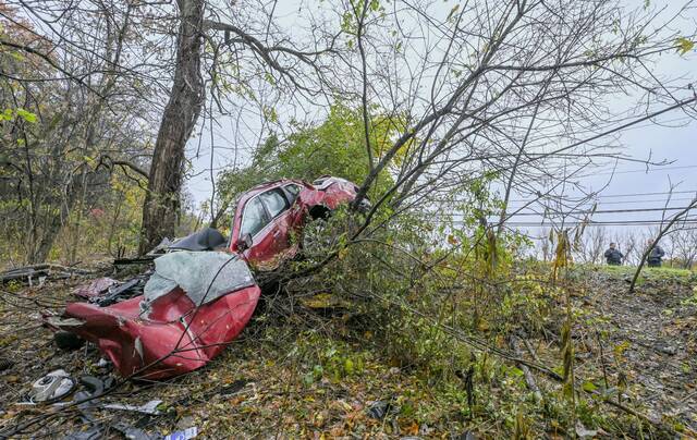 Police say man escaped serious injury after car went off road, down hillside in Plum