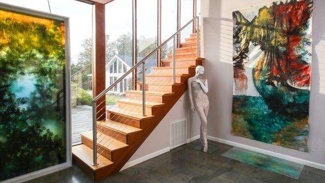 Nearly 20,000 square foot home features solarium, barn, pool and 1,000+ pieces of art