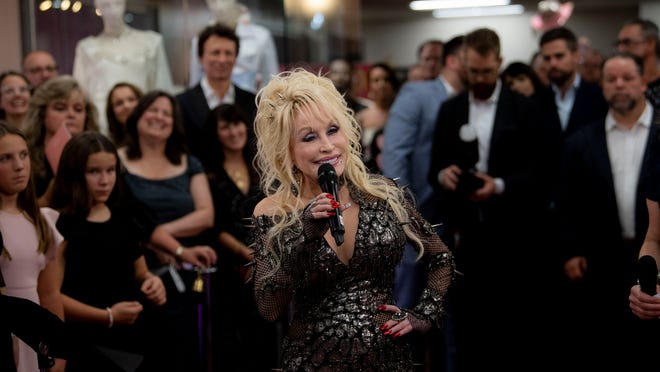 What Dolly Parton said about her fashions on display: ‘That’s a lotta livin’ in those clothes.’