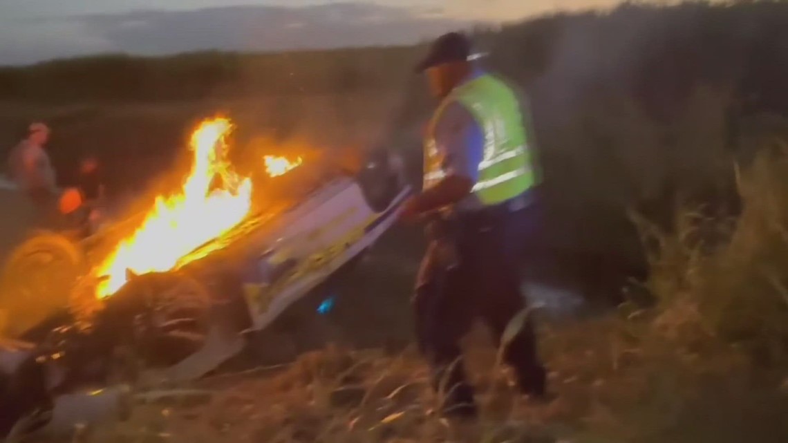 Watch: St. Charles Deputy pulled from overturned, burning police car