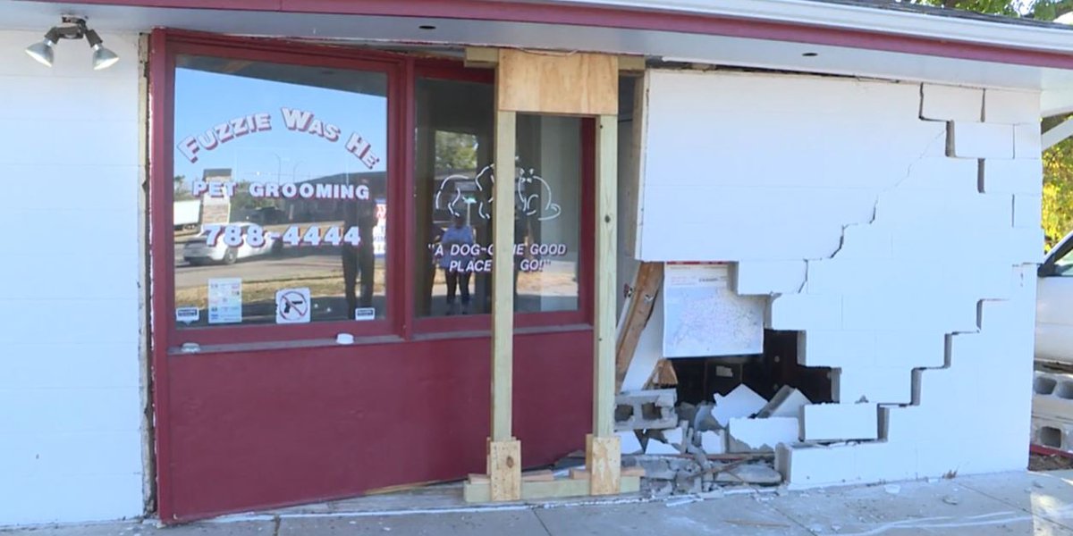 Car slams into building in Derby, heavily damages pet grooming business