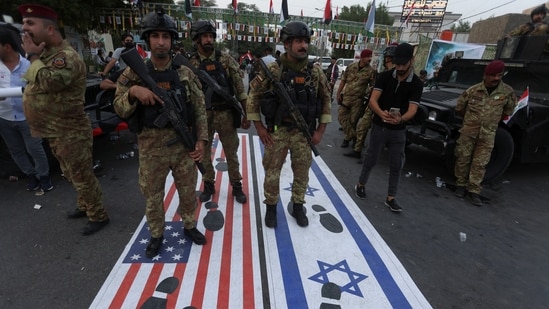 US orders non-emergency staff to leave Baghdad embassy, issues travel advisory