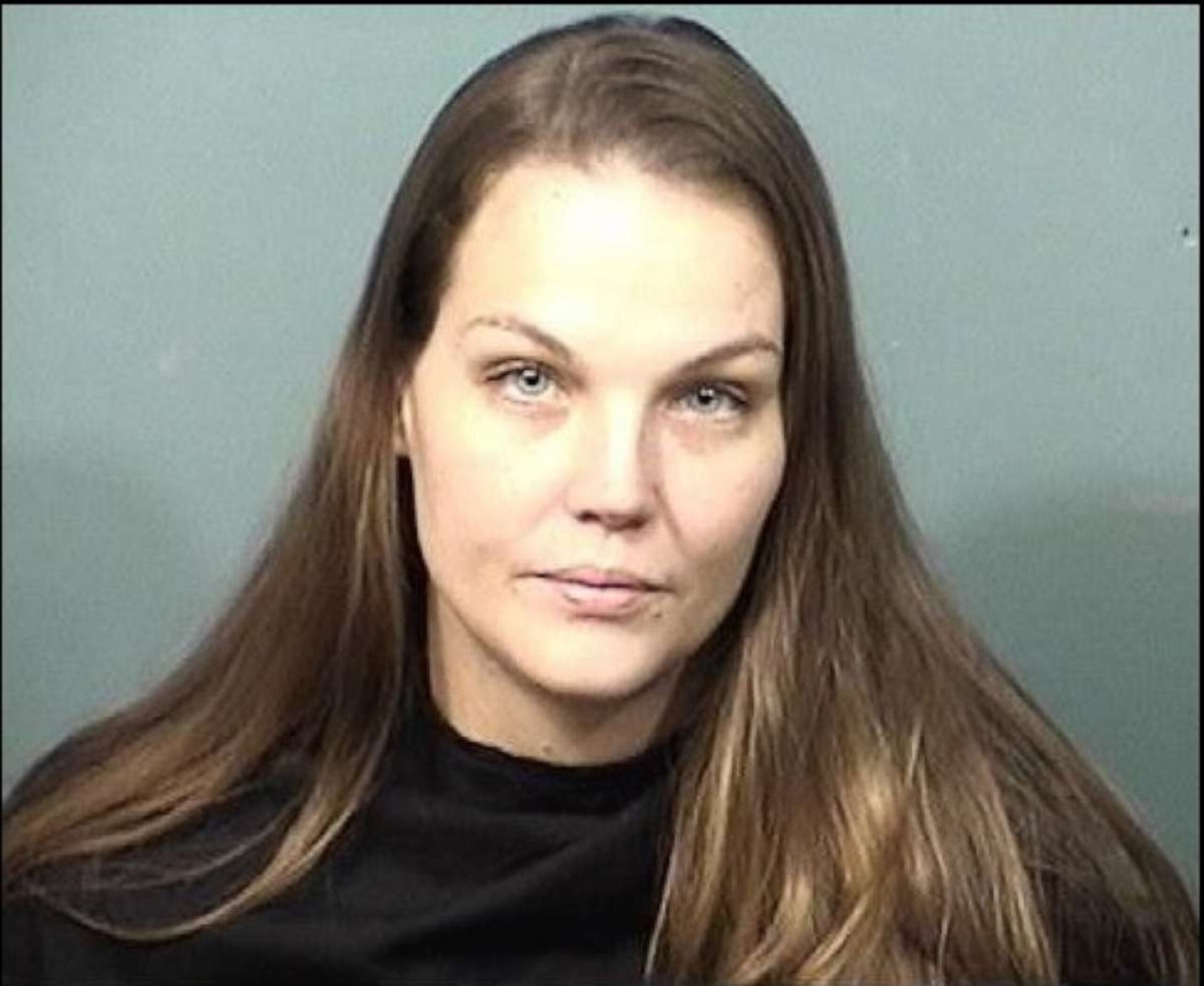 Mother leaves her 2 babies inside idling unlocked car while she goes to a bar