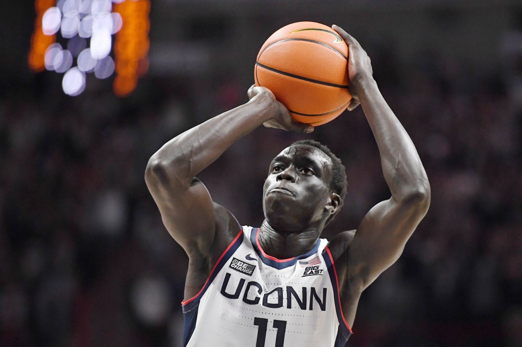 Former UConn men’s basketball player Akok Akok in stable condition after collapsing on court in West Virginia