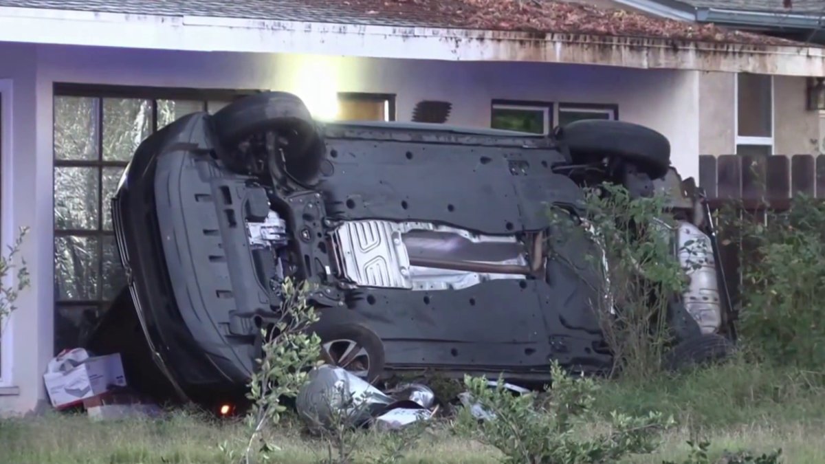 Car crashes into police car during pursuit, rolls over onto Escondido home