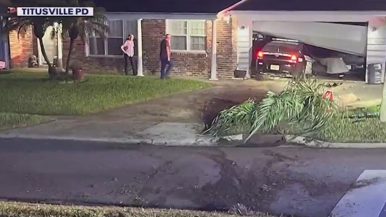 New video shows moments after Titusville police car crashes into home