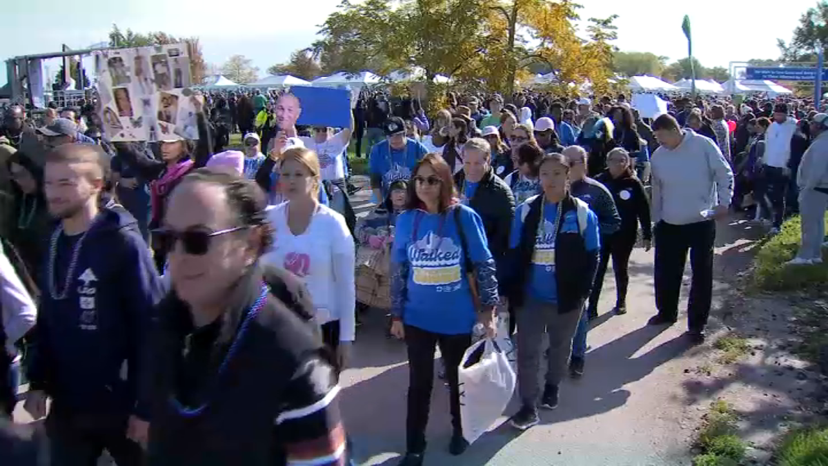 Thousands march in ‘Out of the Darkness’ walk in support of mental health awareness in Uptown