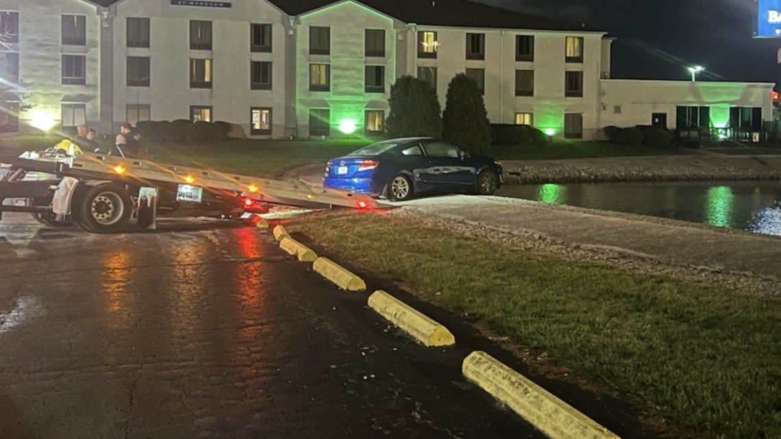 Car drives into pond at hotel near I-75 in Findlay