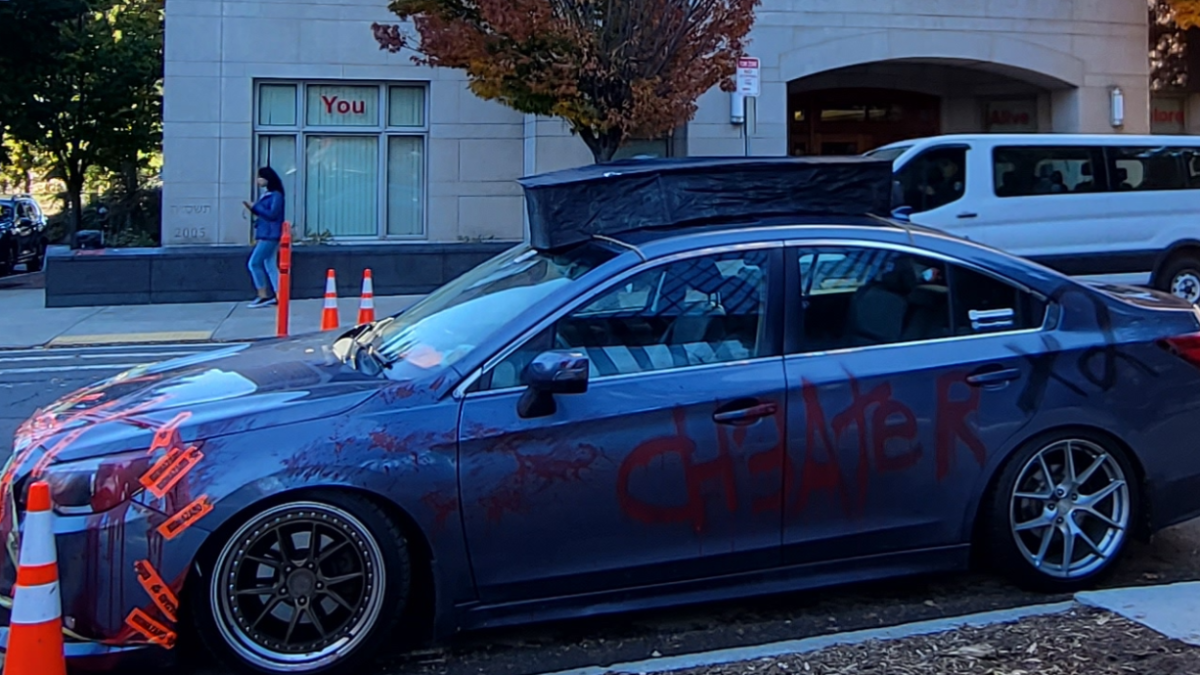 We found out why this car seen around BU has ‘CHEATER’ written across it