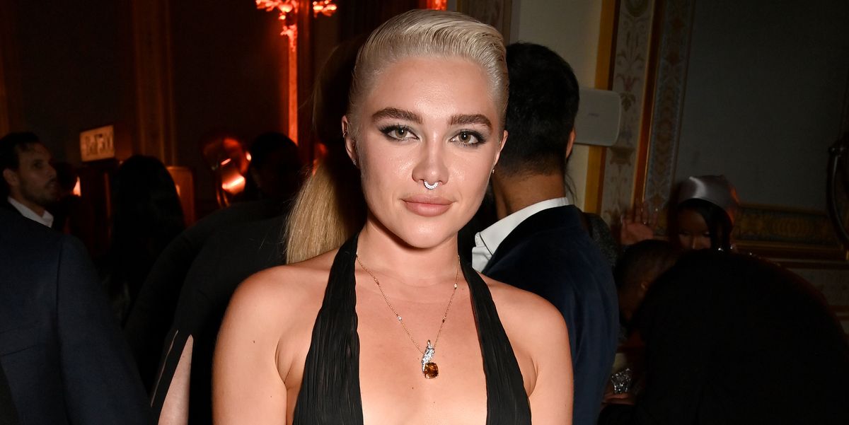 Florence Pugh goes commando in a completely open-sided dress