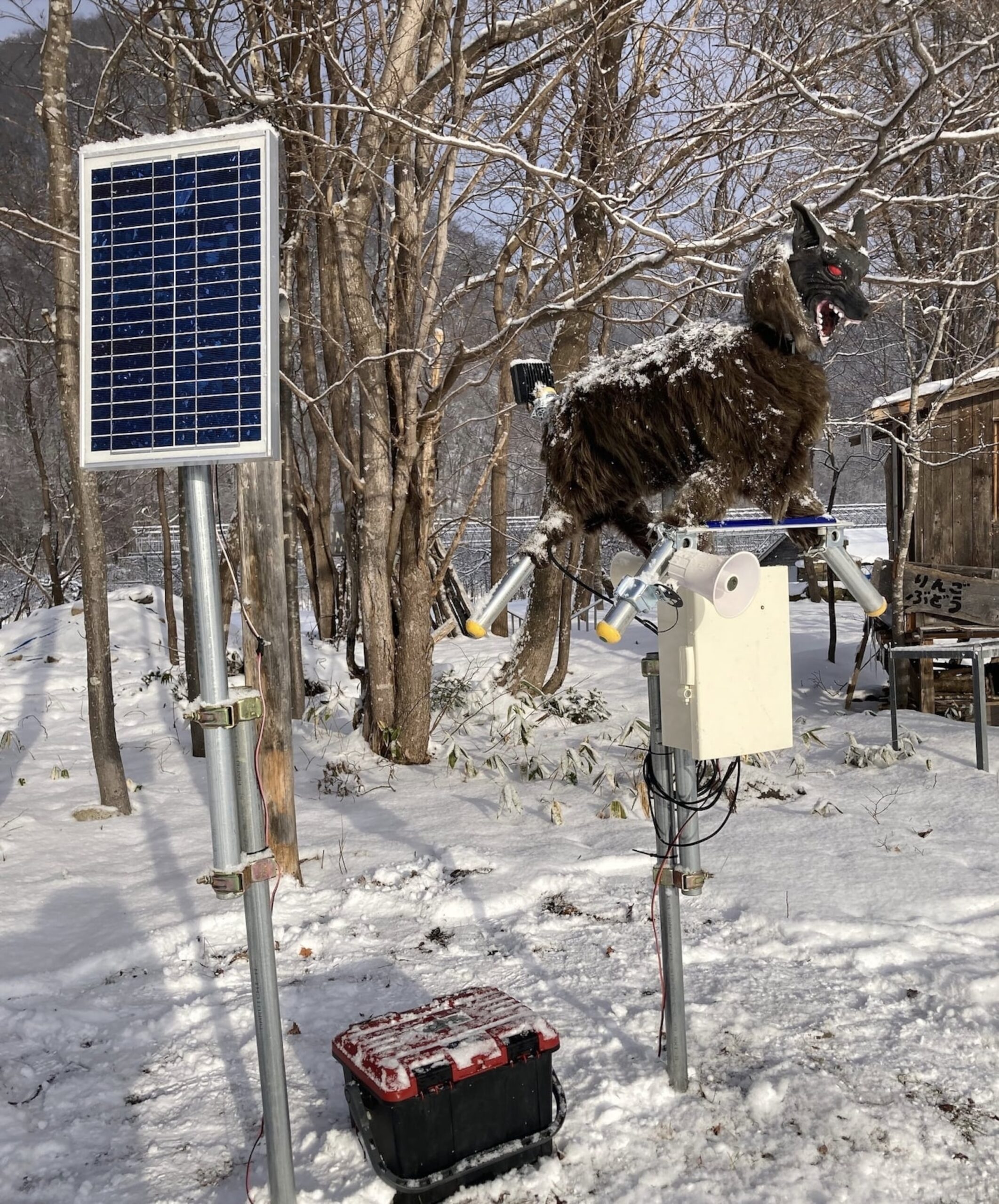 Electronic wolves with glowing red eyes watch over Japanese landscapes