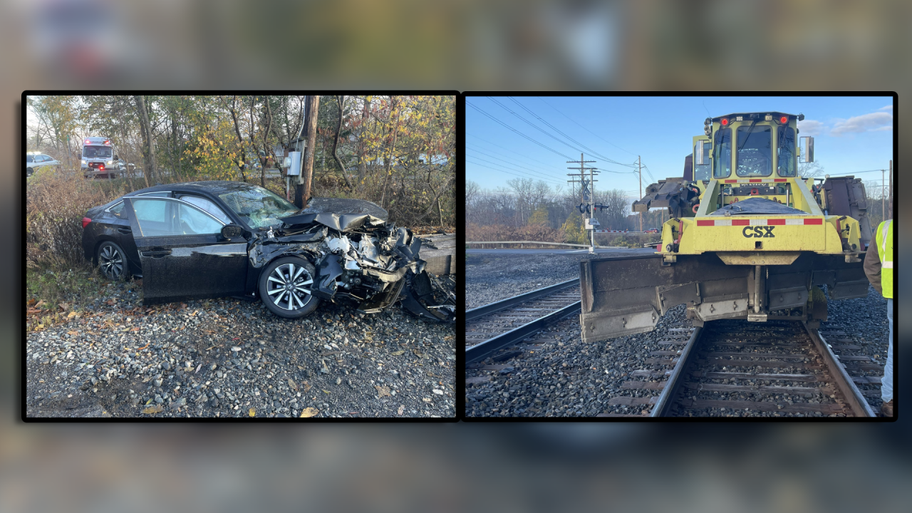 Car collides with railroad maintenance vehicle on E. River Road