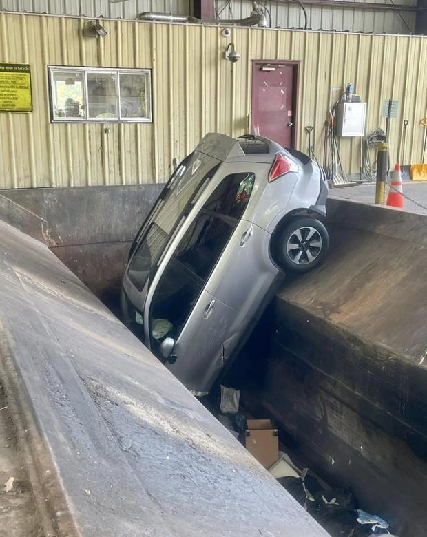 Car ends up stuck in trash compactor at Southboro DPW