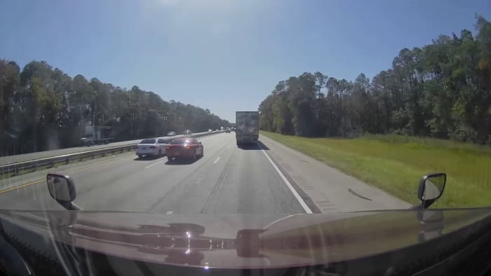 VIDEO: 4 masked men pull up to car, start shooting on I-95 in St. Johns County, deputies say