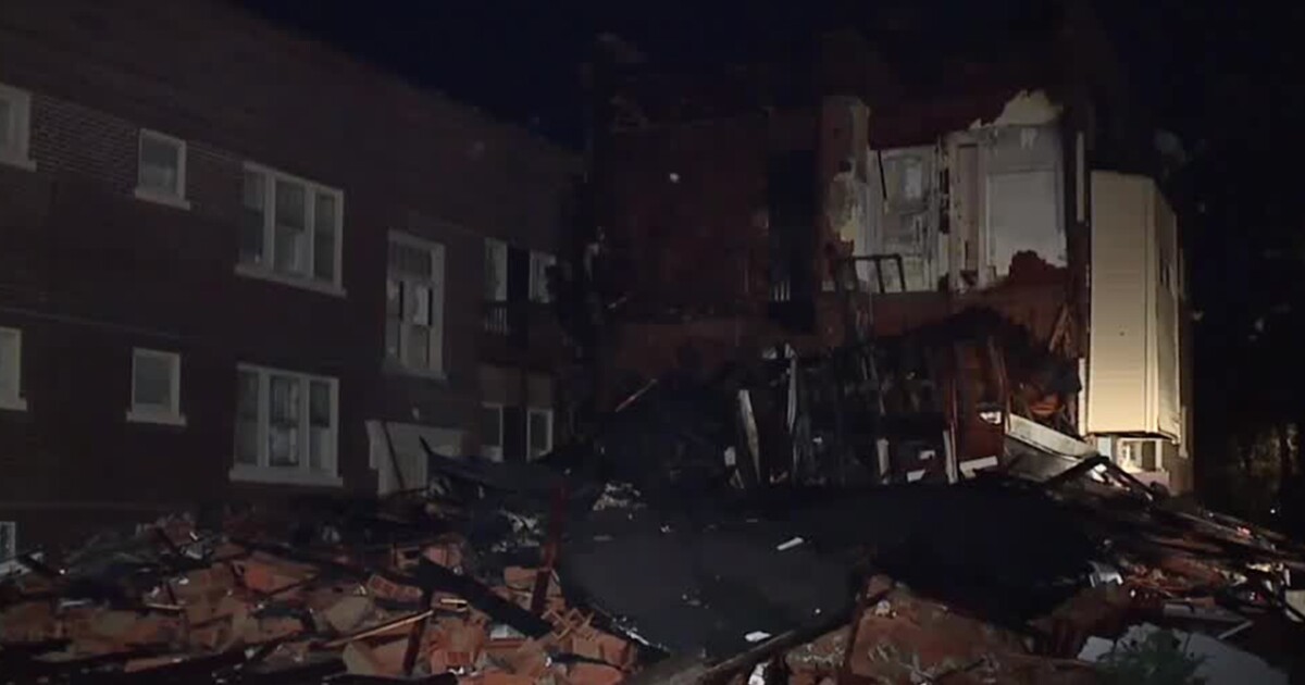 Police search for driver after car crashes into building, killing elderly woman in explosion