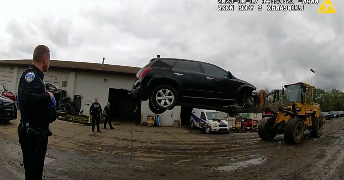 Car lot employees use forklift to stop vehicle with would-be car thief inside until police arrive