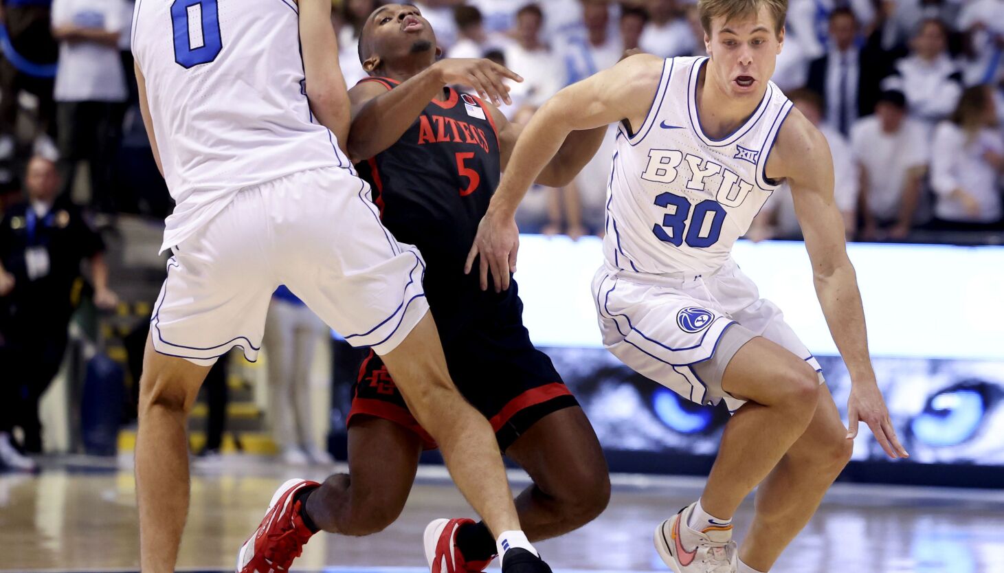 Hall of a win: Hobbling point guard sparks BYU to huge upset of No. 17 San Diego State