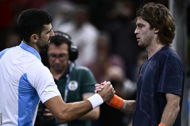 Djokovic fightback sets up Paris final with Dimitrov