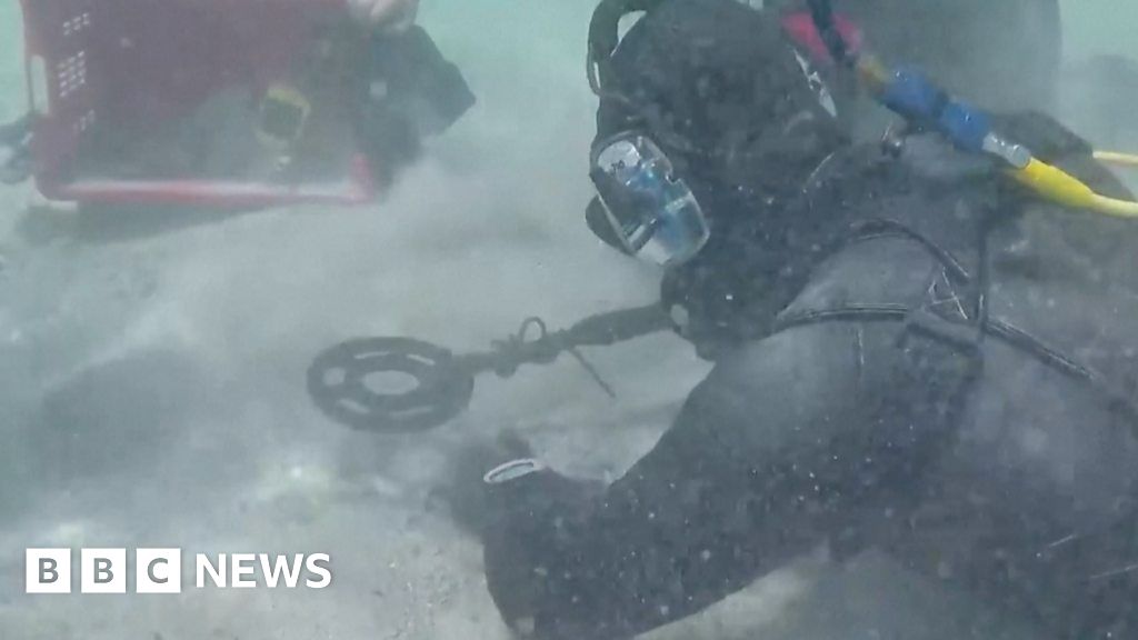 Watch divers recover trove of ancient Roman coins