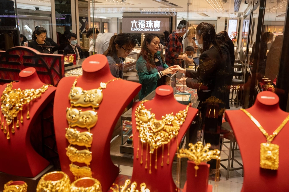 Gold bars and Tokyo apartments: How money is flowing out of China