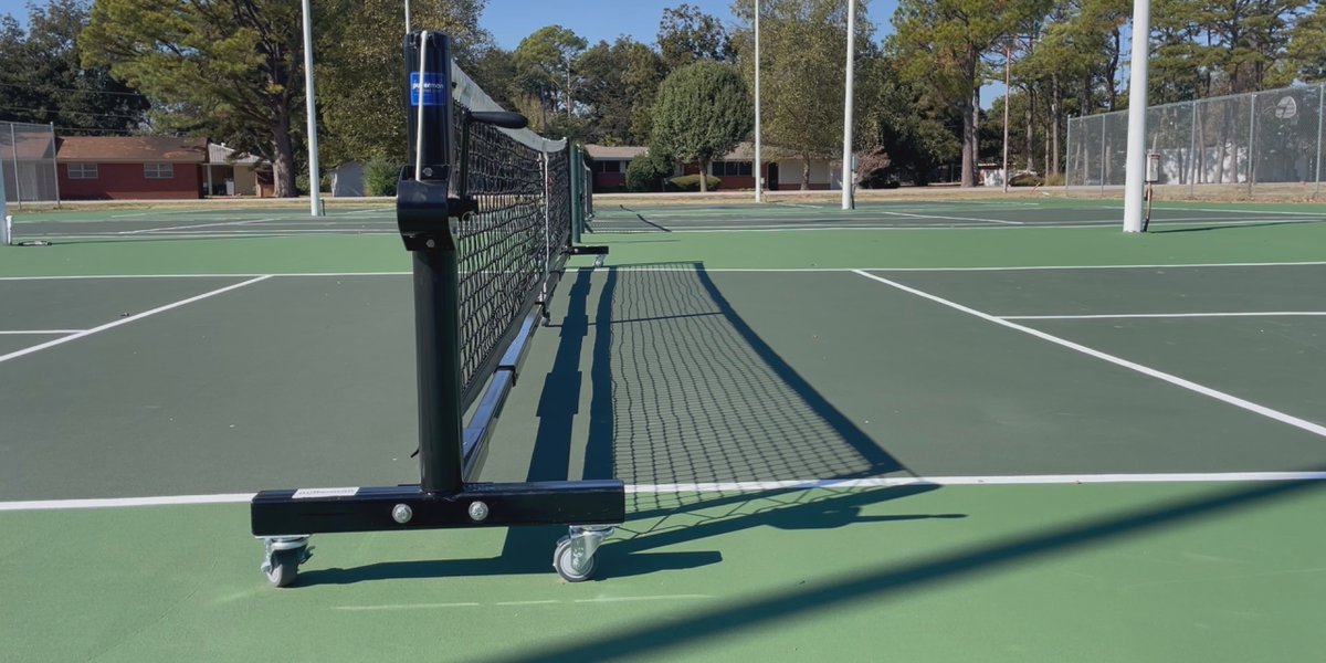 Tennis courts opened and resurfaced