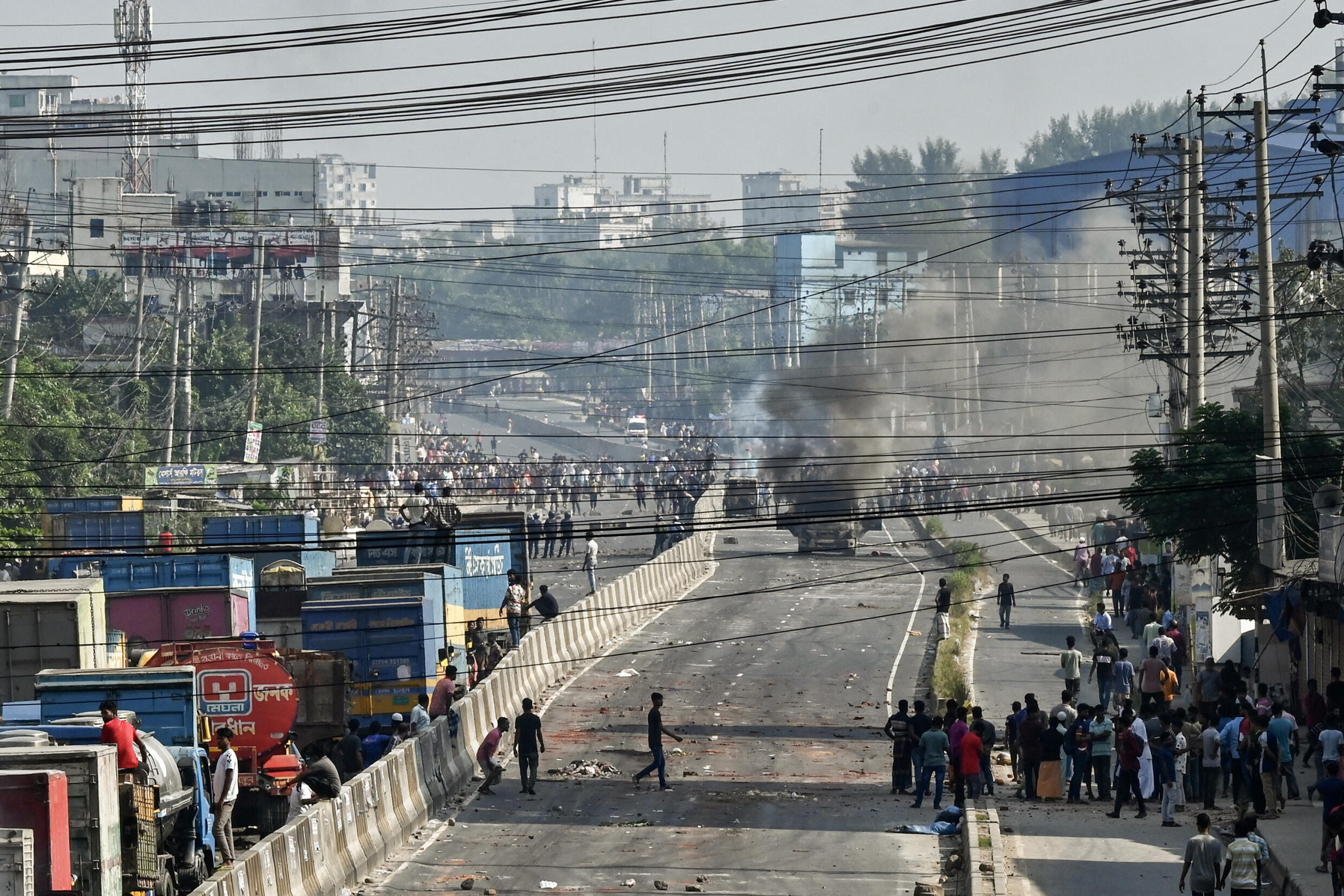 Bangladesh protests halt production for top fashion brands: union