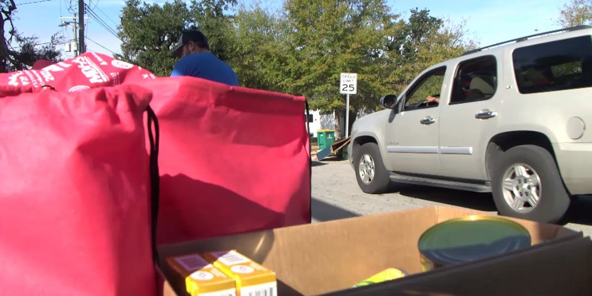 Food giveaway aids 300 families for Thanksgiving