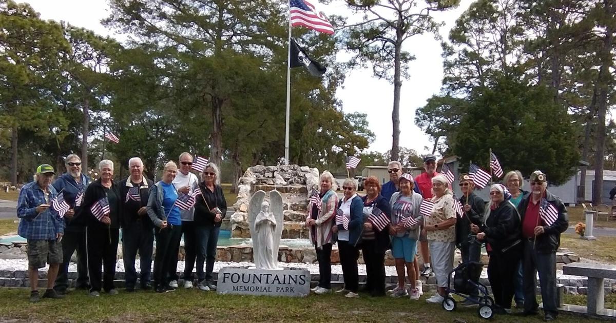 Local veterans decorate graves for Veterans Day