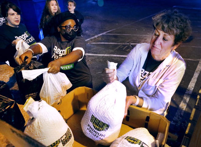 Nourish Food Bank distributes 500 Thanksgiving dinners to families in need