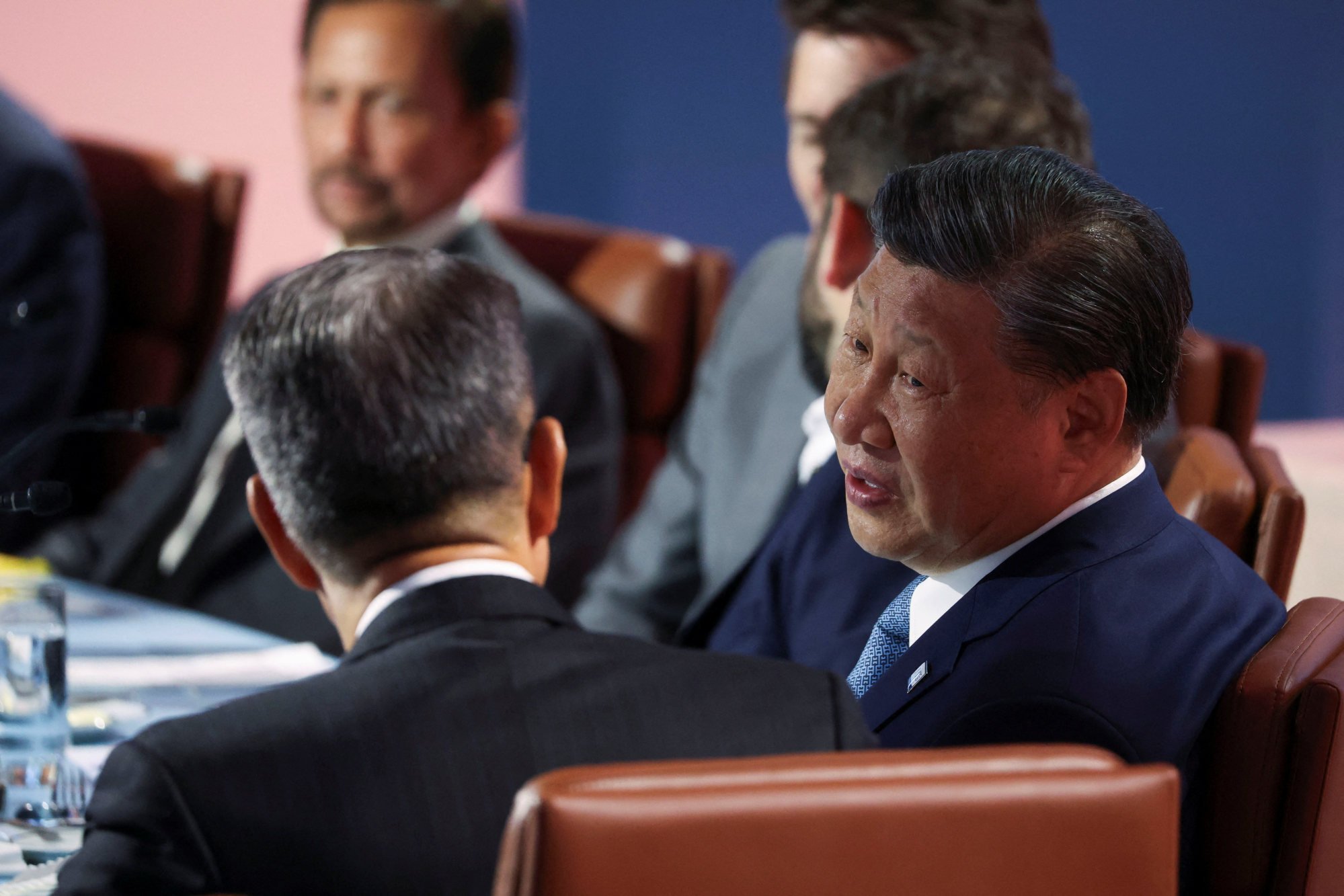 President Xi Jinping, Hong Kong’s Paul Chan find time to chat at Apec summit