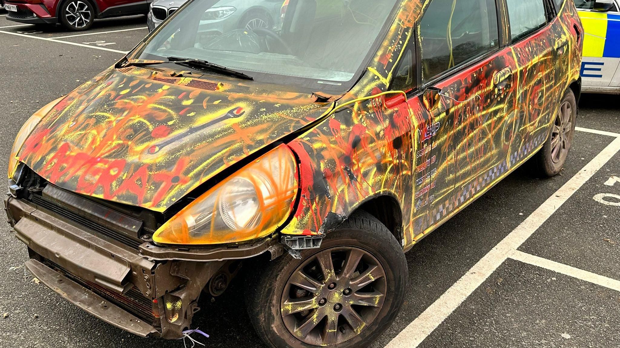 Police stop Watford multicoloured car with parts missing