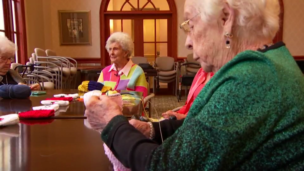 Edgemere ‘Knit Wits’ makes hats for infant cardiology patients at Children’s Health