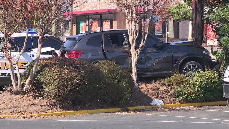 Busted on Buford: Suspect wanted for Chamblee car break-in, robbery crashes into a pole in Doraville