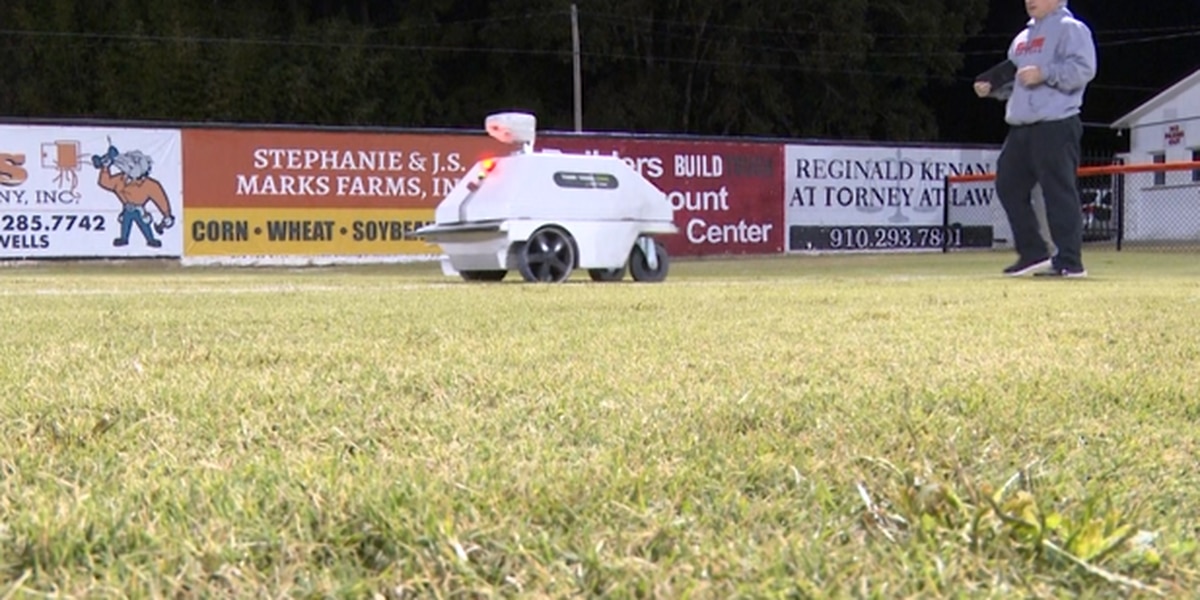 Wallace Rose-Hill coaching staff and field maintenance crew use artificial intelligence robot to help make their job easier