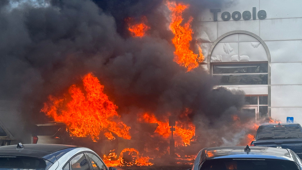 PHOTOS: 27 vehicles damaged in fiery semi-truck crash at Utah car dealership