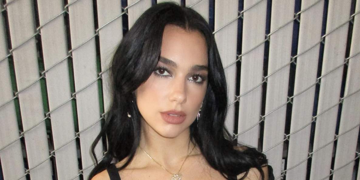 Dua Lipa goes braless in zip-through keyhole cutout dress