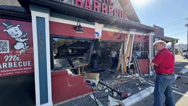 Restaurant Mr. Barbecue damaged after a car crashes into its entrance in North Carolina