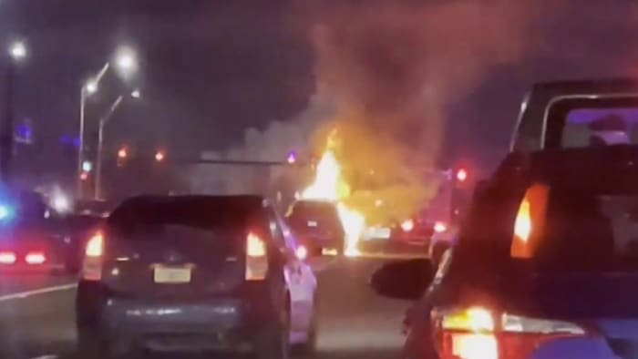 VIDEO: Car bursts into flames after crashing into semi in Orlando