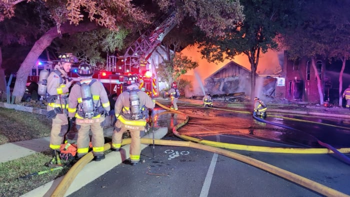 Car in garage explodes into flames, injures woman in home on Northwest Side