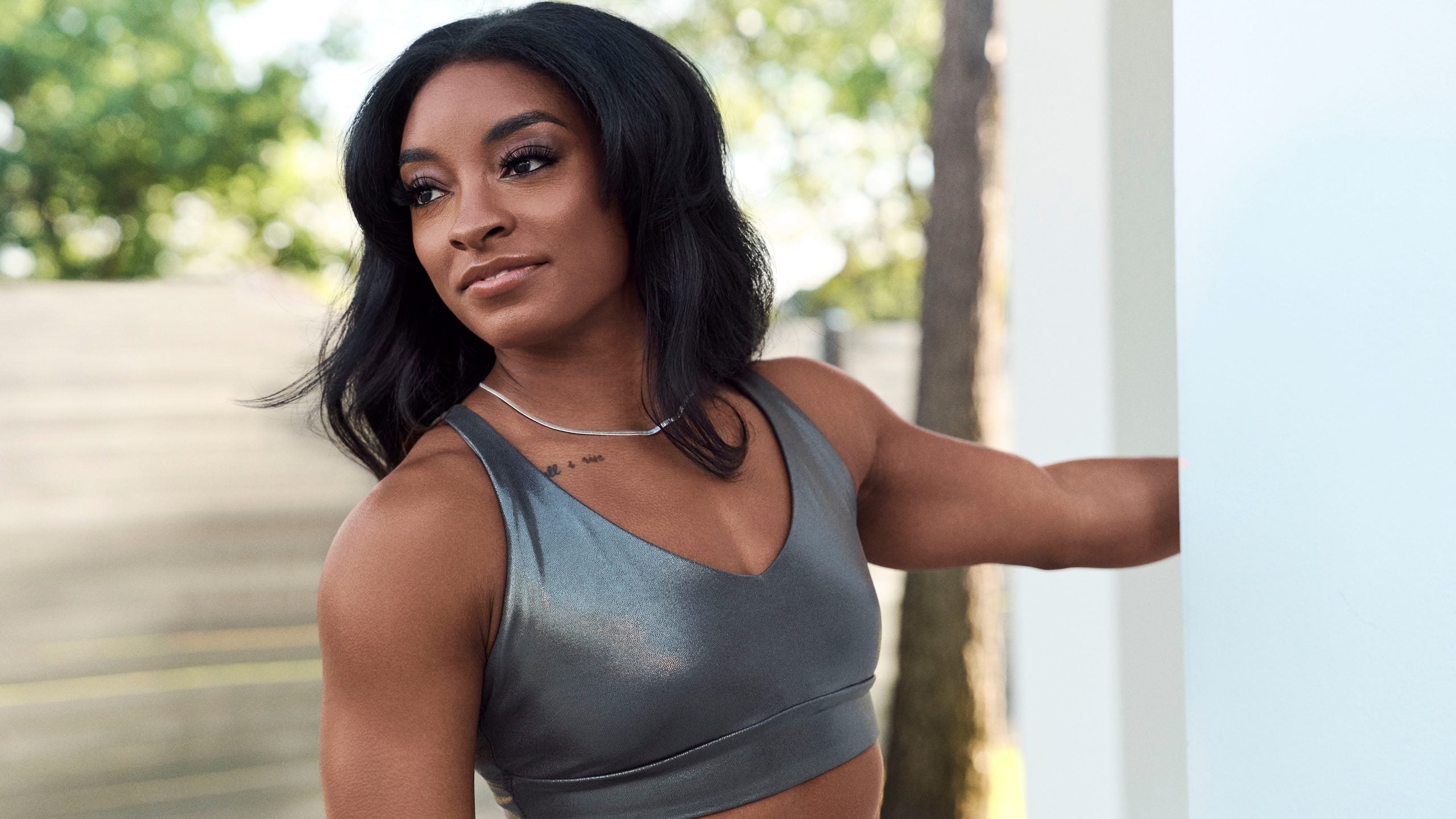 Essence Fashion Digest: Simone Biles Stars In Athleta’s Holiday Campaign, Martine Ali Designs For Converse, And More