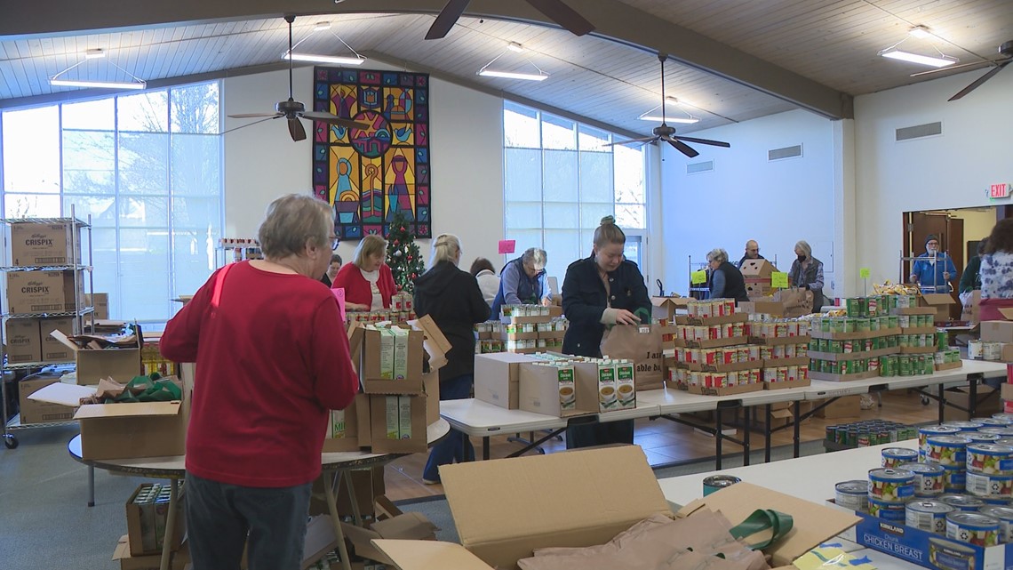 Volunteers pack food bags for Beaverton High School students facing food insecurity