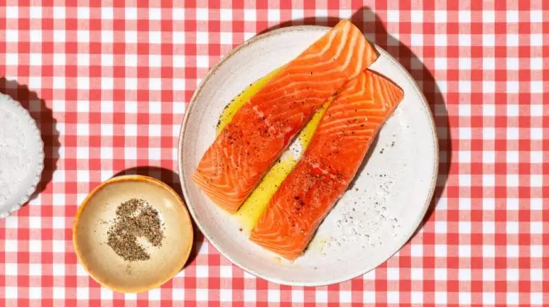 Two salmon fillets on a plate