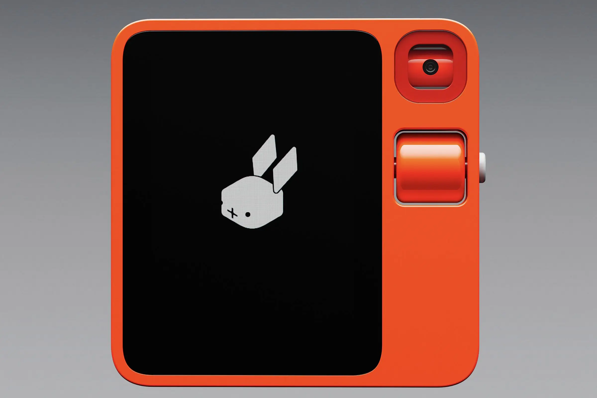 A photo of the red Rabbit R1 on a gray background.