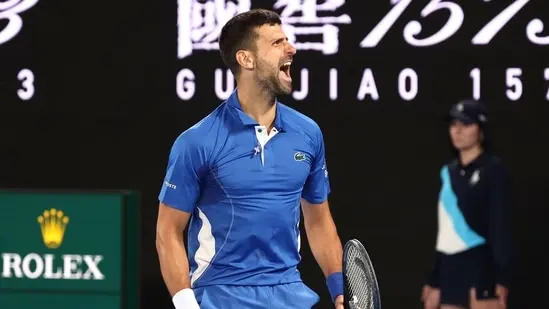 Serbia's Novak Djokovic celebrates a match point against Australia's Alexei Popyrin during their men's singles match on day four of the Australian Open tennis tournament in Melbourne on January 17(AFP)